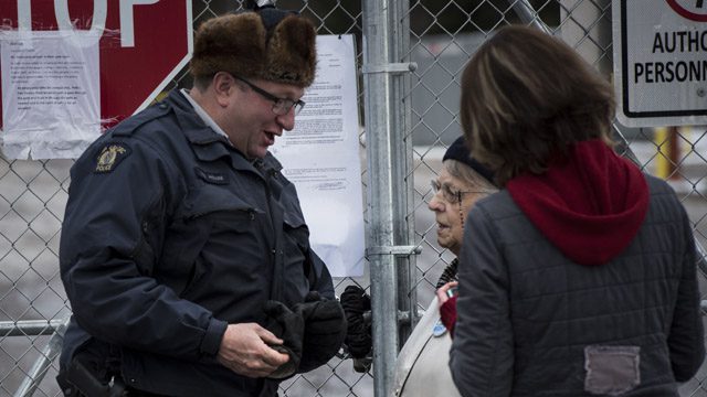 Dorothy Michelin speaking to an RCMP officer Saturday. Submitted photo.