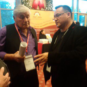 Pikwakanagan First Nation Coun. Cliff Meness discusses the passing of the AFN resolution against the Zibi condo project with Anishinabek Nation Grand Chief Patrick Madahbee. APTN/Photo