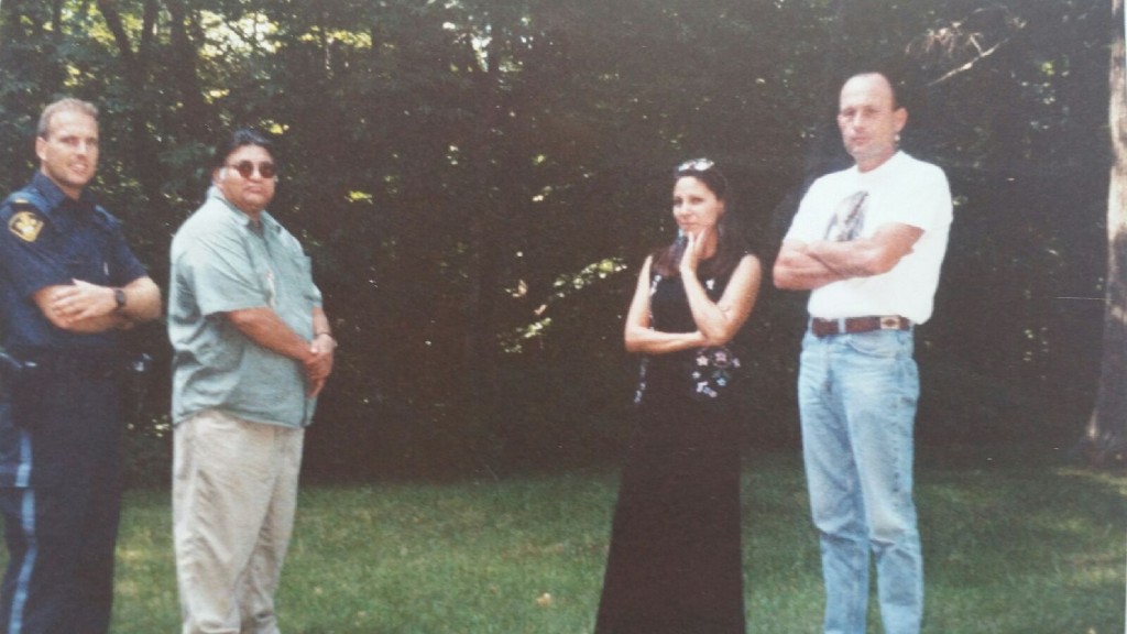 Sgt. Chris Gheysen, left, with Dan Smoke, Mag Cywink and her husband Tom Wopperer, far right, in this undated photo. Submitted.