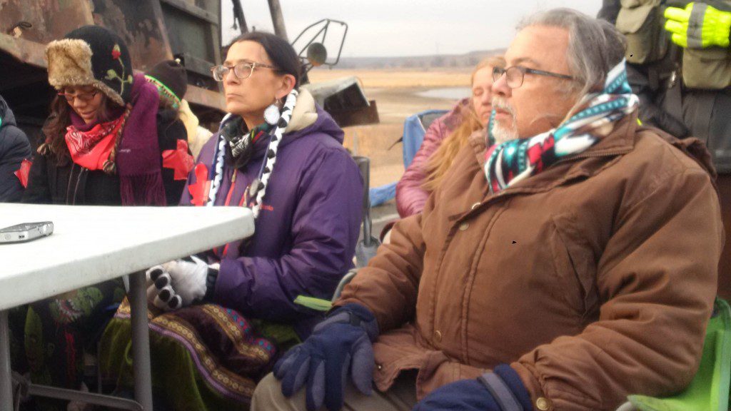 Robert “Black Eagle” Costa, foreground, held another veteran, an Elder, in his arms and felt him begin to die. APTN/Photo